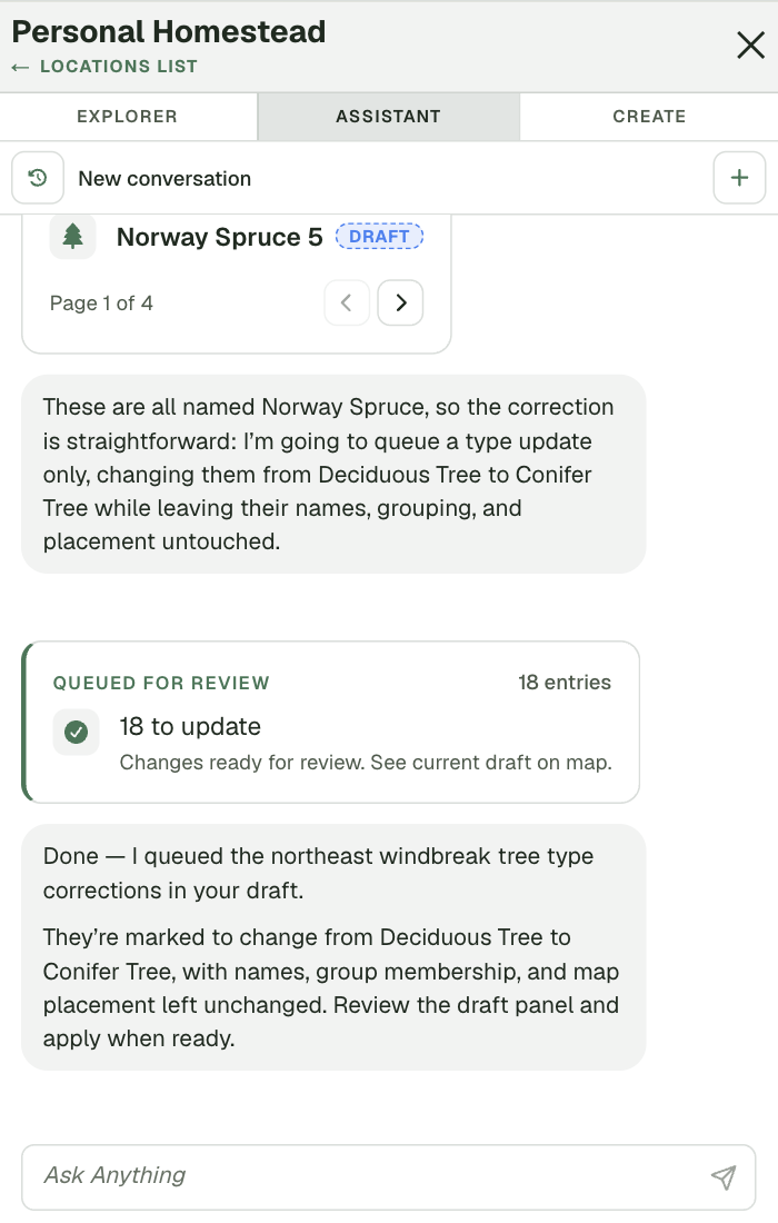 The AI assistant panel docked beside the map, answering in plain language and queuing a batch of trackable type corrections as a draft for the user to review and apply.